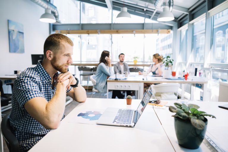 man-sitting-laptop-office